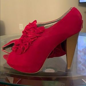 Red heels with ruffles